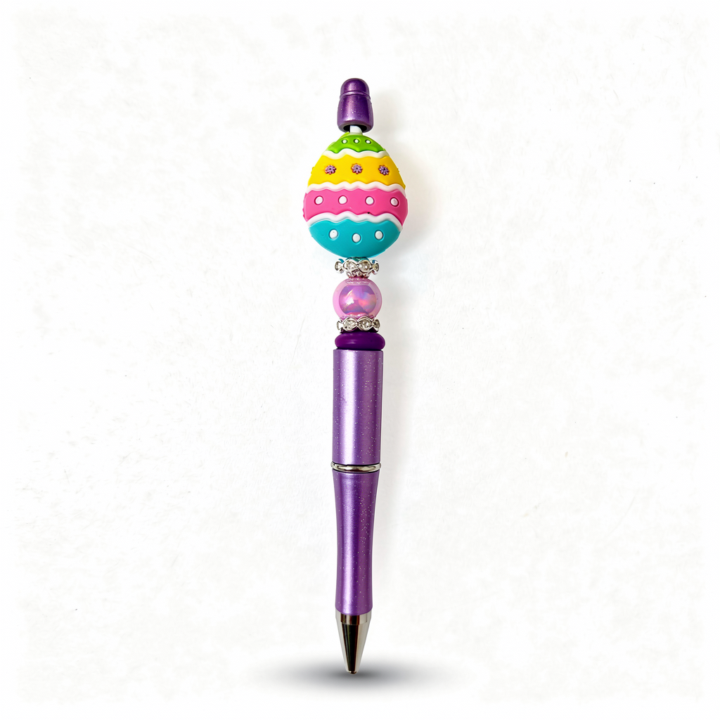 Colorful pen with decorative top on a white background