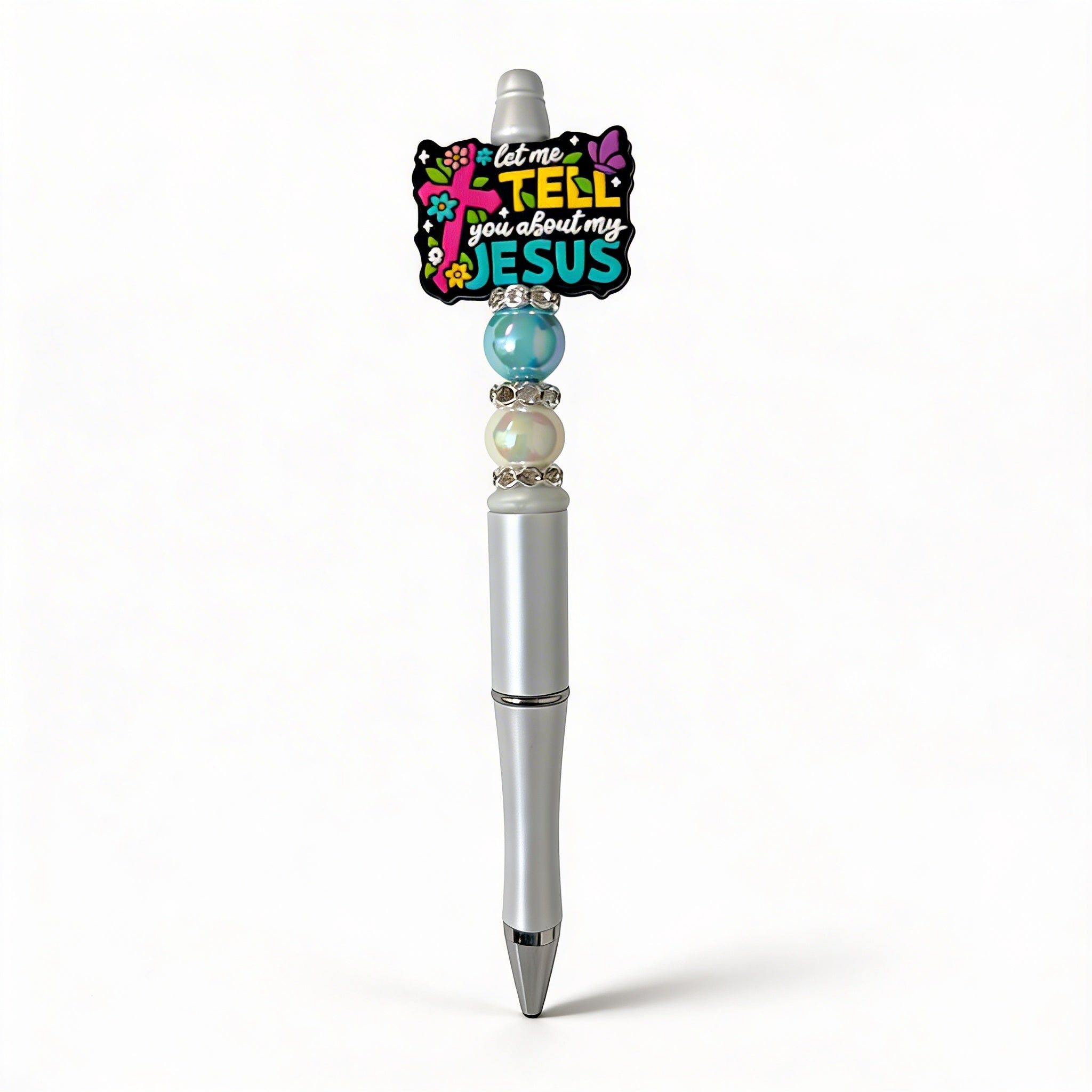 Pen with decorative top featuring text and beads on a white background
