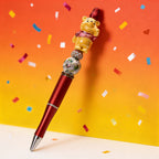 Decorative bear novelty pen displayed on colorful background
