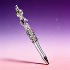Sparkling designer style crystal rhinestone pen on colorful background