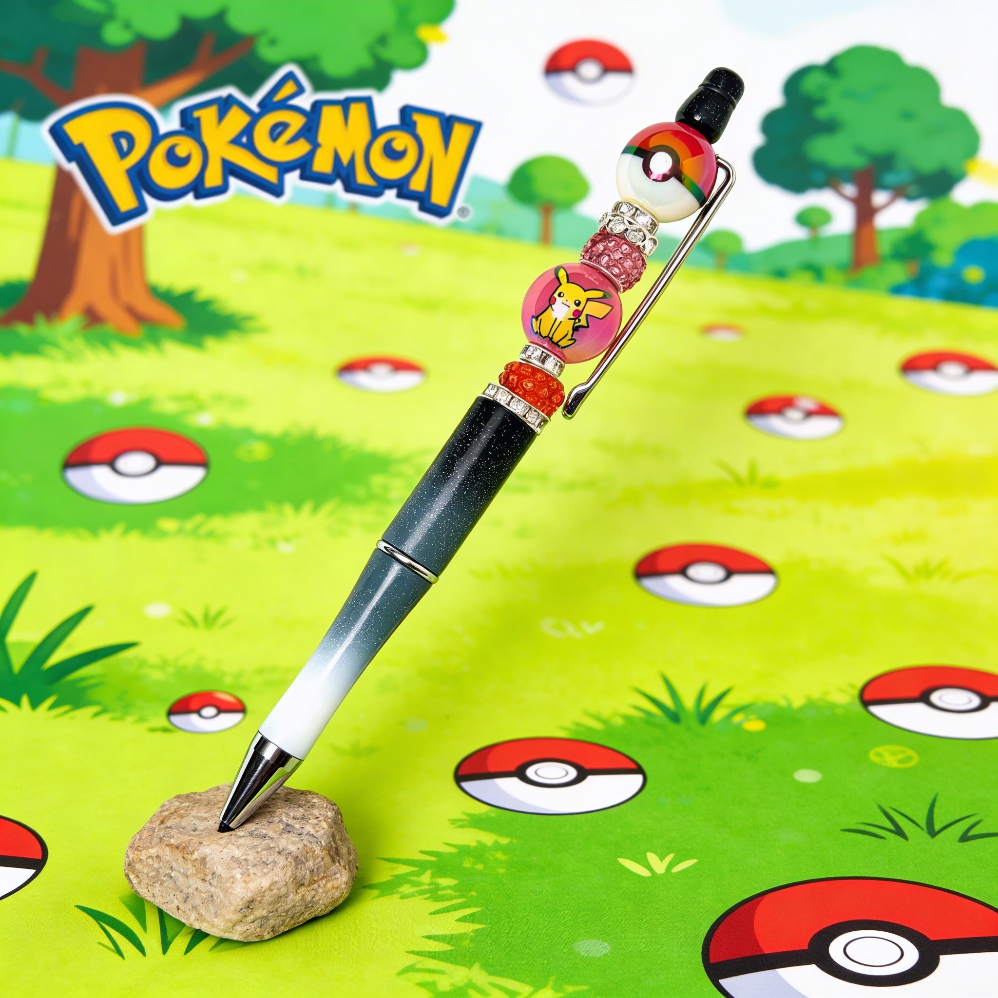 Decorative monster ball style novelty pen displayed on colorful background